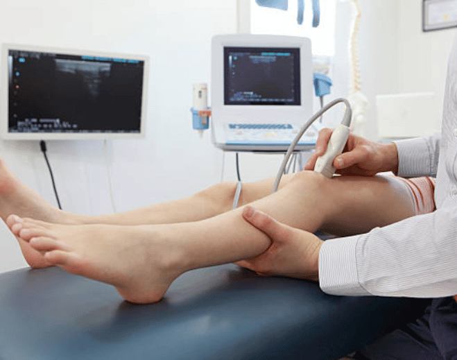 Ultrasound examination being performed on leg