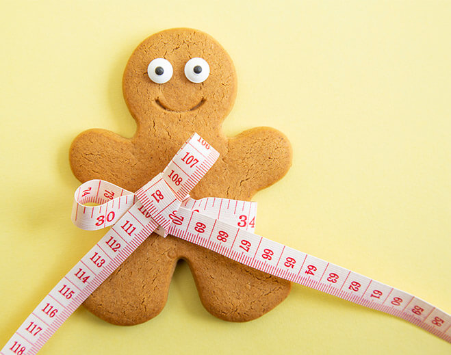 Galleta con cinta métrica alrededor