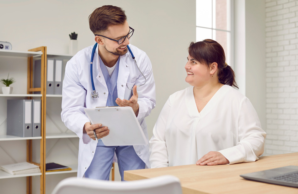 Clinician discussing medical information with patient