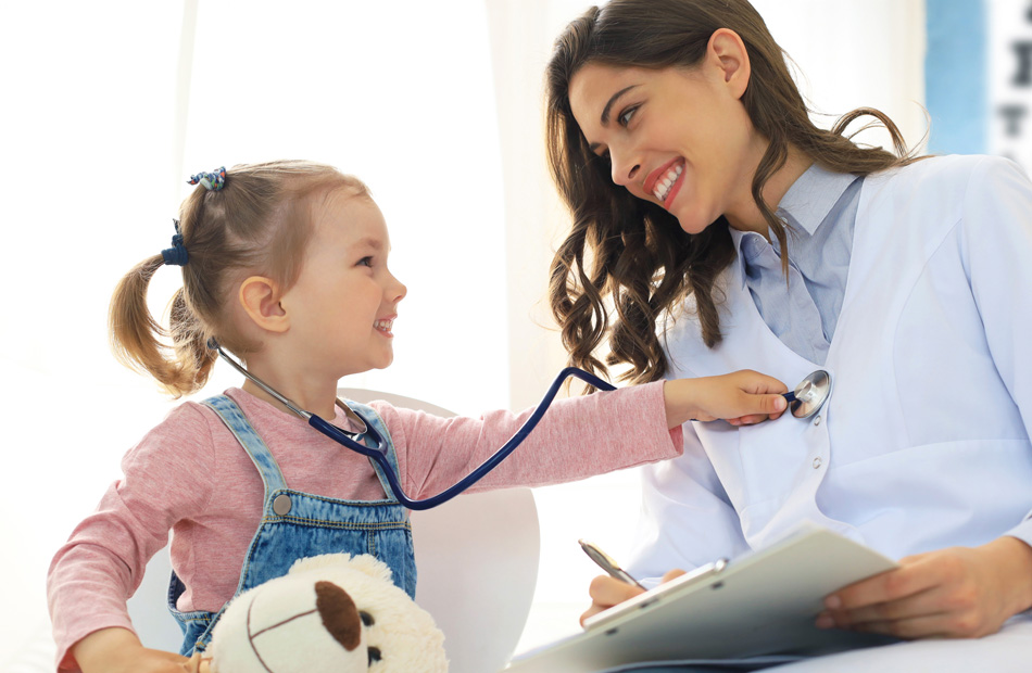 Child using stethoscope on clinician