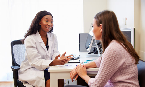Doctor consulting with patient in clinic