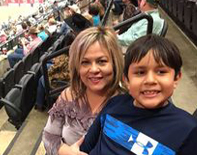 Juanita Sawchak and her son, Wesley Jr., enjoy the S.A. Stock Show & Rodeo in February 2023.