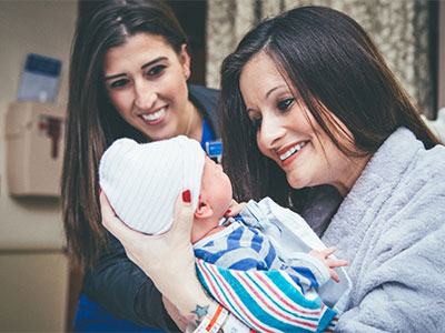 ncbh-nurse-with-new-mom-and-baby